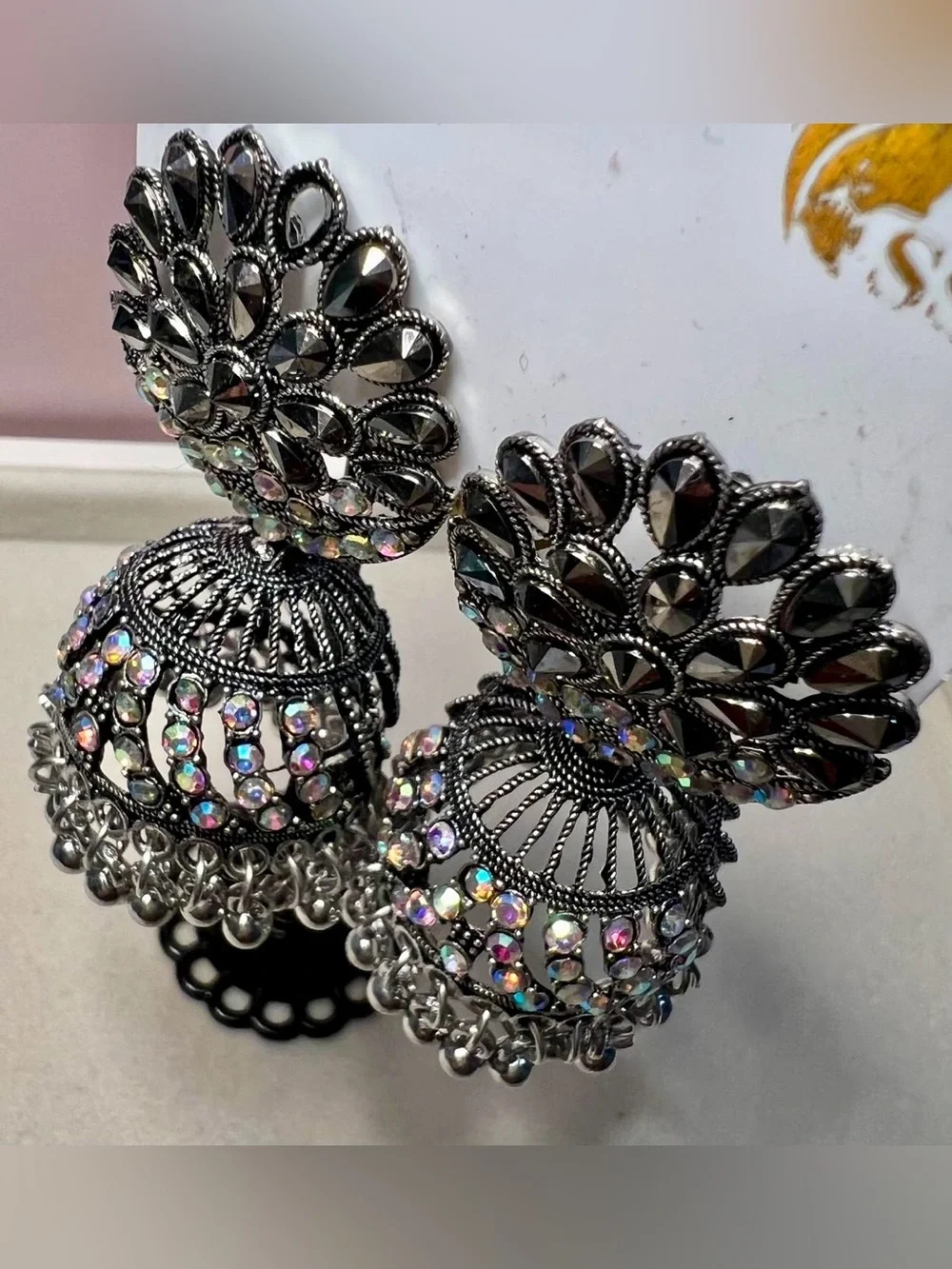 Silver Jhumka Earrings with Iridescent Crystal Accents